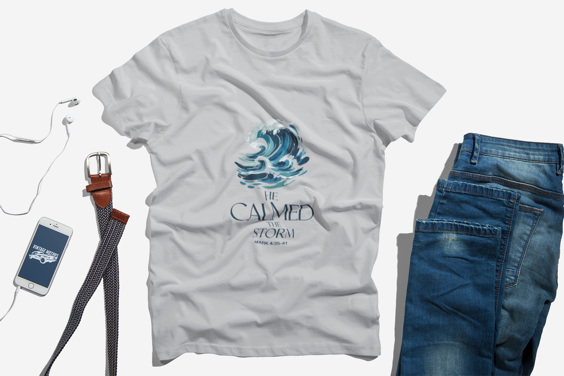 He Calmed the Storm Christian T-Shirt — Dramatic Waves Faith Tee